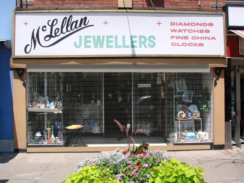 Jewelry storefront with a painted steel roll-up door 