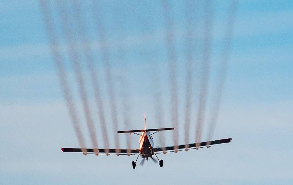 Public domain Photo of an aircraft spraying chemicals.